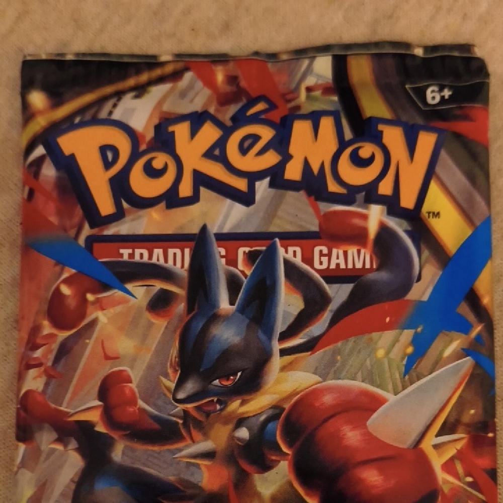 Pokémon Trading Card Pack with Red and Blue Accents